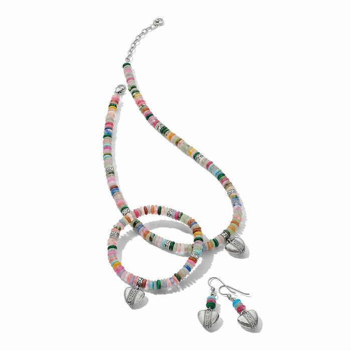 Brighton necklace, bracelet, and drop earrings set with multicolor beads and silver-plated heart charms on a white background
