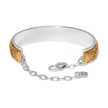 Brighton bangle bracelet with two-tone finish, engraved gold star medallions, and silver chain clasp on a white background