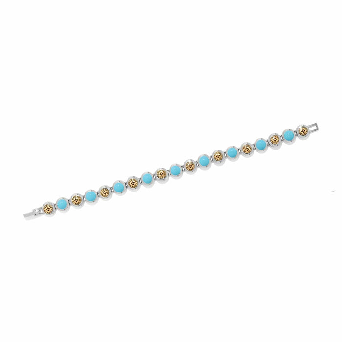 Brighton bracelet with turquoise beads and gold-tone medallion stations in silver-tone two-tone setting on a white background