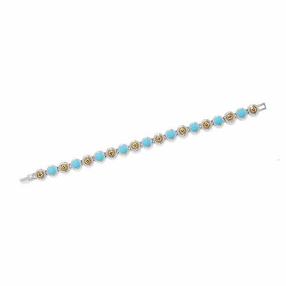 Brighton bracelet with turquoise beads and gold-tone medallion stations in silver-tone two-tone setting on a white background