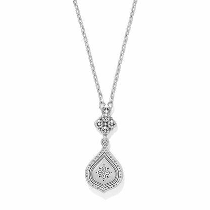 Brighton pendant necklace with teardrop-shaped two-tone medallion, beaded accents, and crystal details on a white background