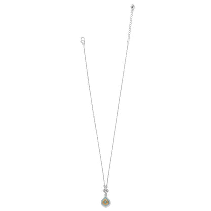 Brighton pendant necklace with two-tone teardrop charm, turquoise enamel, crystal accents, and silver-tone chain on a white background