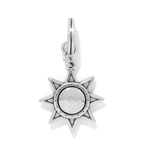 Brighton star charm with silver-plated eight-point design and hammered round center medallion on a white background