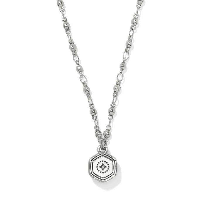 Brighton pendant necklace with hexagonal medallion, crystal center, and silver-tone beaded chain on a white background
