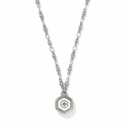 Brighton pendant necklace with hexagonal medallion, crystal center, and silver-tone beaded chain on a white background