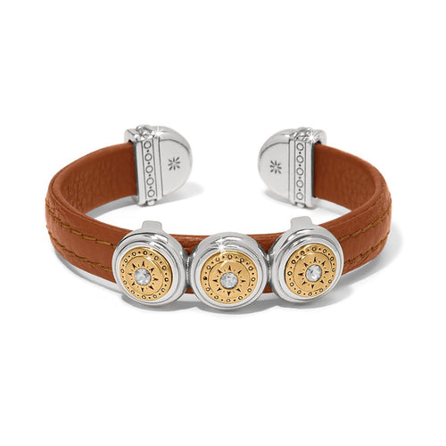 Brighton leather cuff bracelet in tan with two-tone medallions and crystal centers on a white background