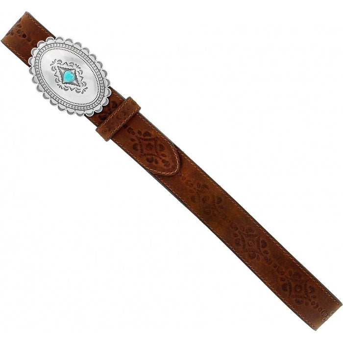 Brighton tooled brown leather belt with oval silver-tone concho buckle and turquoise stone accent on a white background