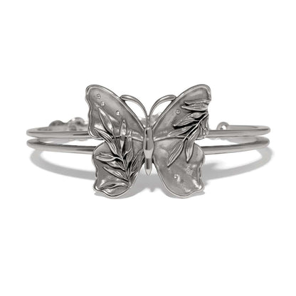 Brighton silver-plated cuff bracelet with butterfly centerpiece featuring leaf details and crystal accents on a white background