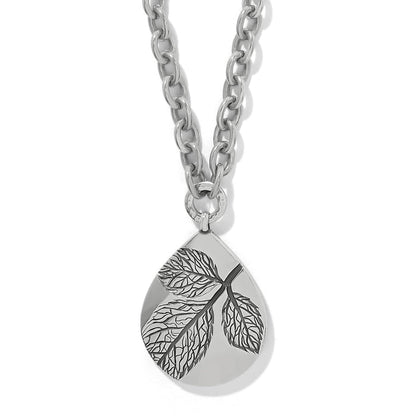 Brighton pendant necklace with silver-plated teardrop featuring engraved leaf design and chunky chain on a white background