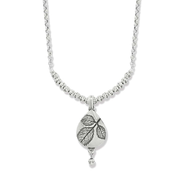 Brighton pendant necklace with silver-plated teardrop leaf design and beaded chain accent on a white background