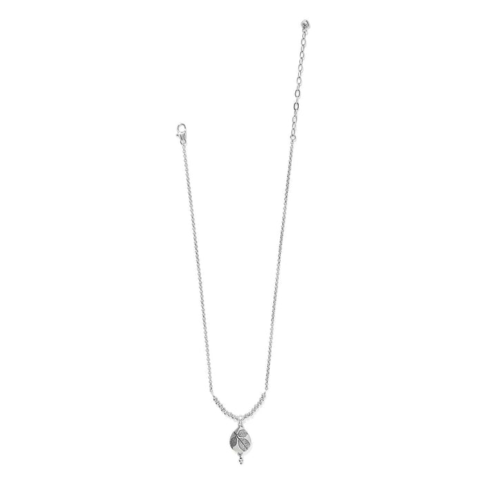 Brighton pendant necklace with silver-plated leaf charm, beaded accents, and lobster clasp on a white background