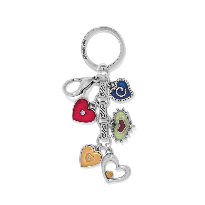 Brighton keychain with silver-tone ring and assorted heart charms in red, blue, gold, and enamel on a white background