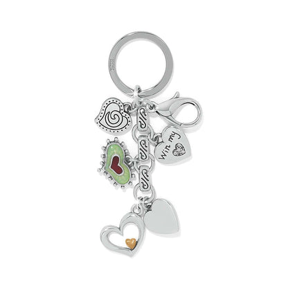 Brighton keychain with multiple silver-tone heart charms, green and red enamel accent, and crystal details on a white background