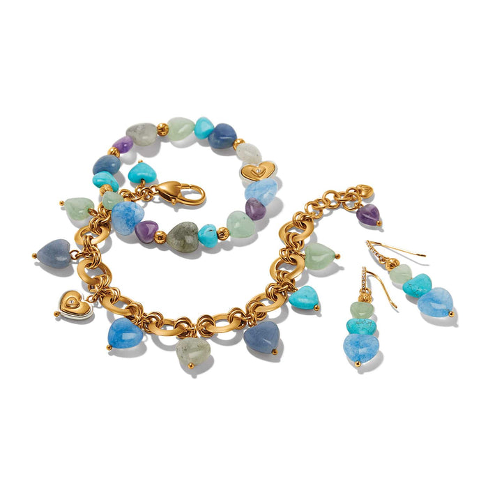 Brighton bracelet set and drop earrings with multicolored heart-shaped stones and gold-tone chain on a white background