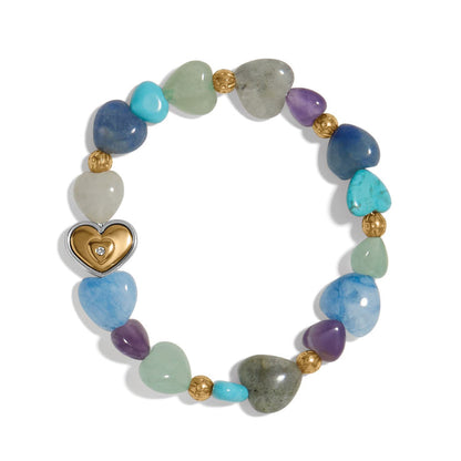 Brighton stretch bracelet with multicolor gemstone heart beads, gold-plated accents, and central heart charm on a white background