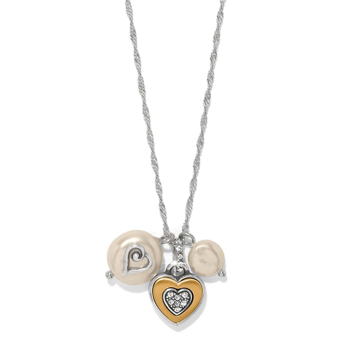Brighton charm necklace with two-tone heart pendant, crystal accents, and coin glass pearls on a white background