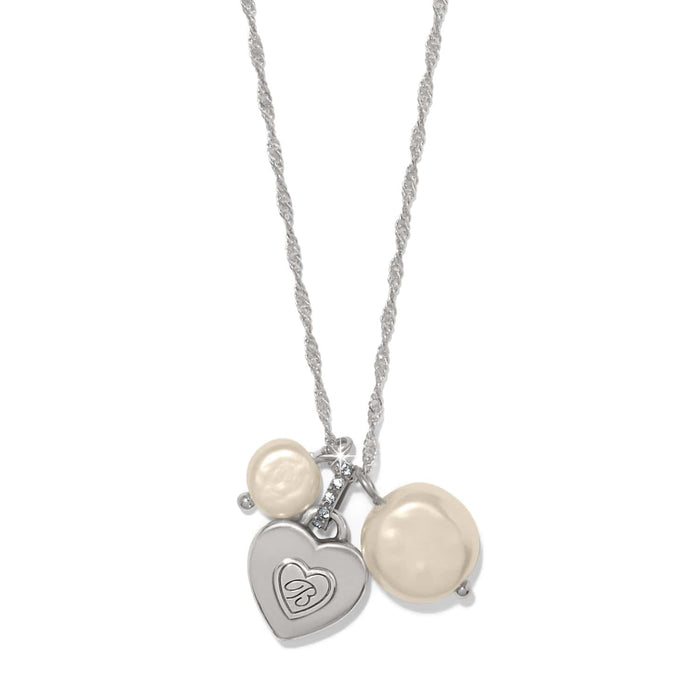 Brighton charm necklace with silver-tone heart pendant, glass pearls, and crystal accents on a white background