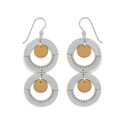 Brighton drop earrings with two-tone double silver hoops and gold-tone discs with engraved details on a white background