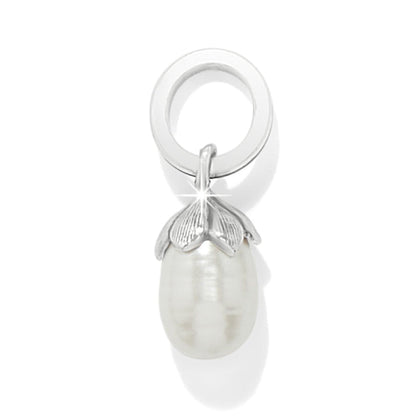 Brighton charm with silver-plated floral cap and rice pearl drop suspended from a polished ring on a white background