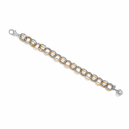 Brighton chain link bracelet with two-tone gold and silver rings, lobster clasp, and silver ball charm on a white background