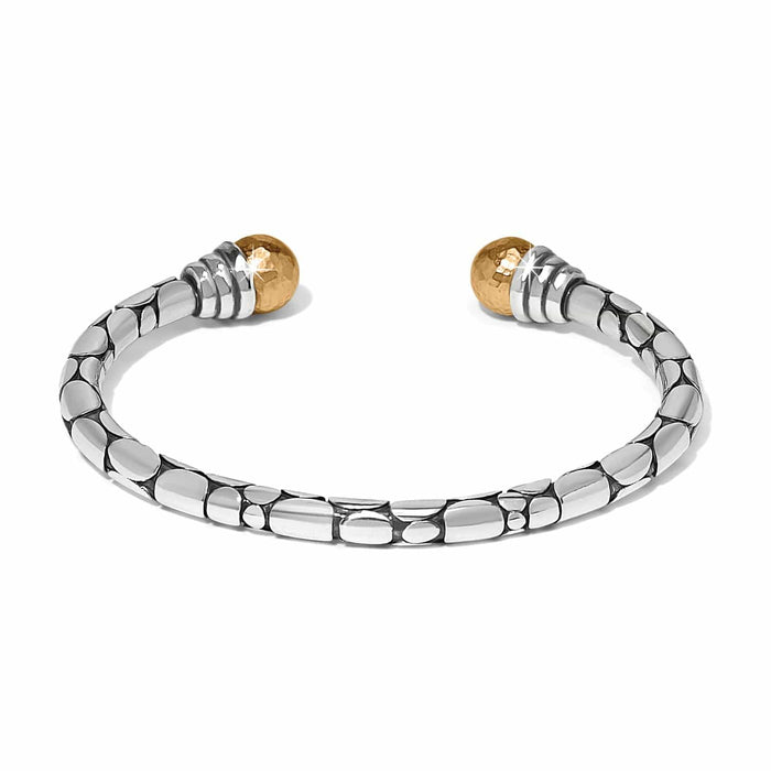 Brighton cuff bracelet with silver-tone pebbled texture and two-tone hammered gold ball end caps on a white background