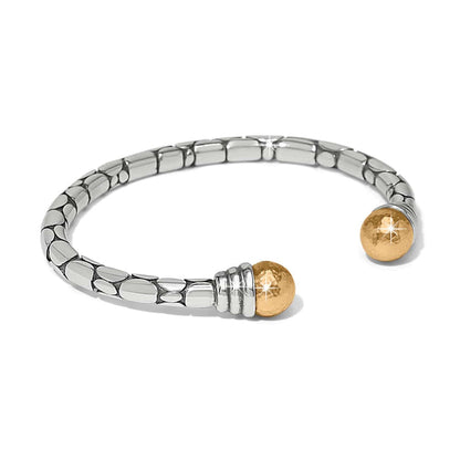 Brighton cuff bracelet with silver-tone pebbled texture and hammered gold-tone ball ends on a white background