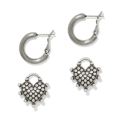 Brighton interchangeable hoop earrings with ribbed silver-plated bands and dotted heart-shaped charms on a white background