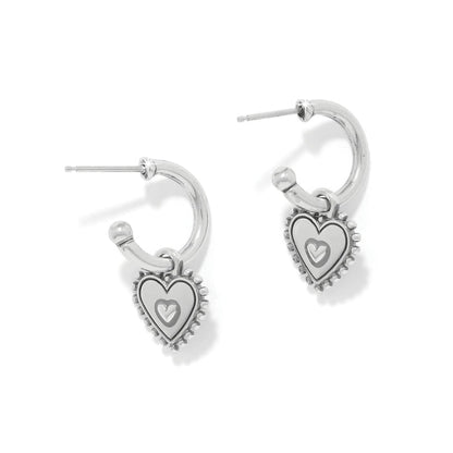Brighton hoop earrings with silver-plated heart charms featuring white enamel and beaded edges on a white background