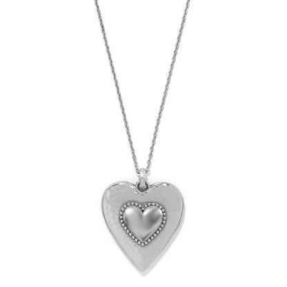 Brighton heart pendant necklace with silver-plated hammered finish and beaded center heart on a white background