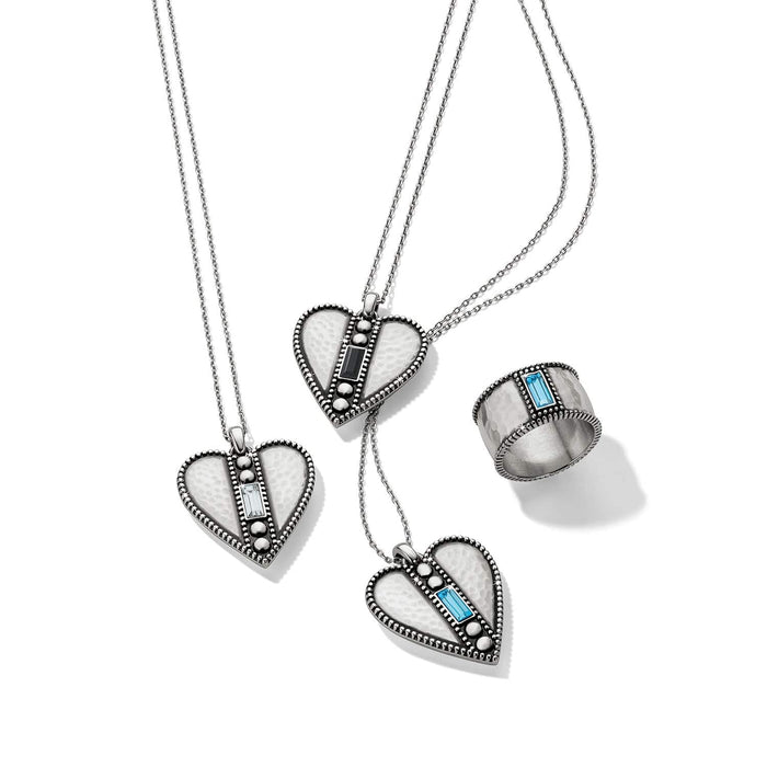 Brighton silver-plated heart pendant necklaces and ring with crystal accents styled together on a white background