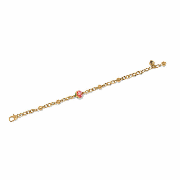 Brighton gold-plated chain bracelet with floral enamel bead and small round bead accents on a white background
