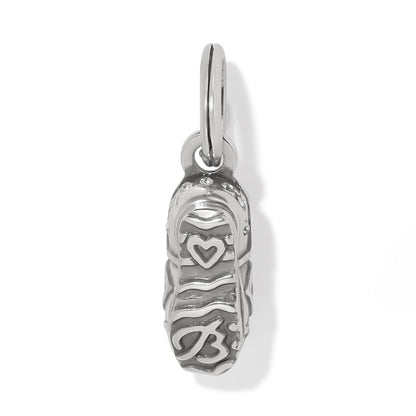 Brighton baby shoe charm with silver-plated finish, heart detail, and split ring on a white background