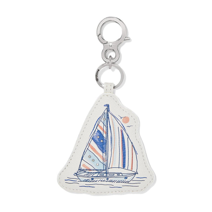 Brighton leather bag charm with illustrated sailboat print, crystal accents, and silver-tone clasp on a white background