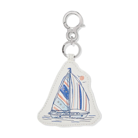 Brighton leather bag charm with illustrated sailboat print, crystal accents, and silver-tone clasp on a white background