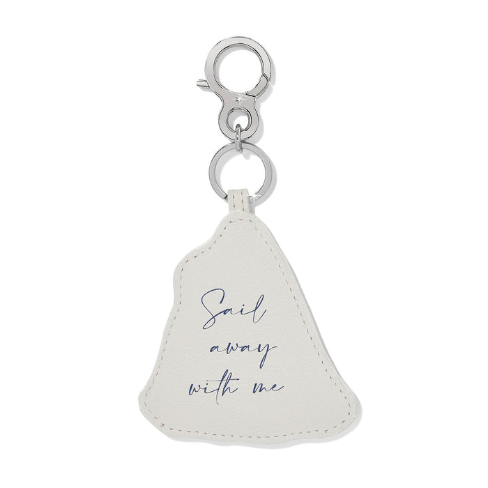 Brighton leather keychain in cream with navy script reading Sail away with me and silver-tone clasp on a white background