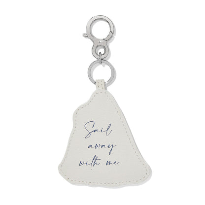 Brighton leather keychain in cream with navy script reading Sail away with me and silver-tone clasp on a white background