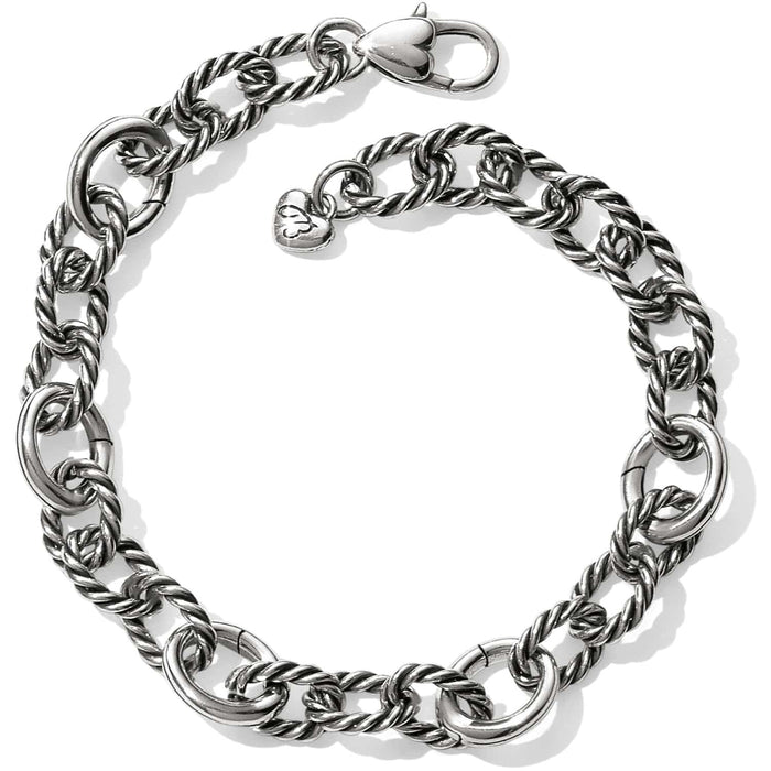 Brighton silver-plated link bracelet with twisted rope oval links, lobster clasp, and heart charm on a white background