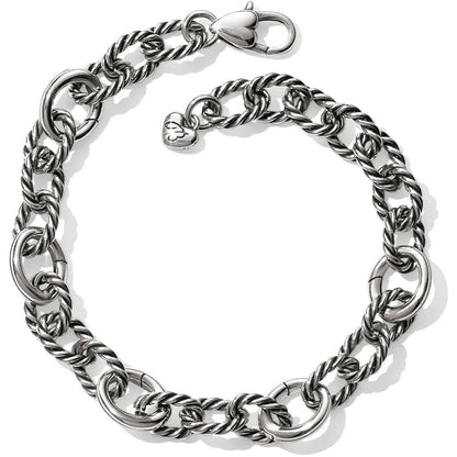 Brighton silver-plated link bracelet with twisted rope oval links, lobster clasp, and heart charm on a white background