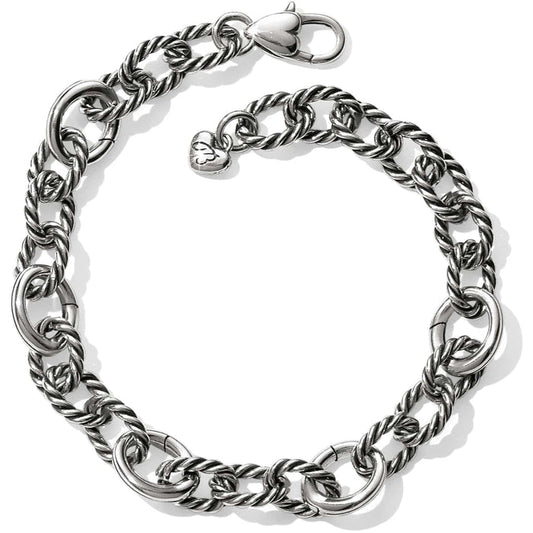 Brighton silver-plated link bracelet with twisted rope oval links, lobster clasp, and heart charm on a white background