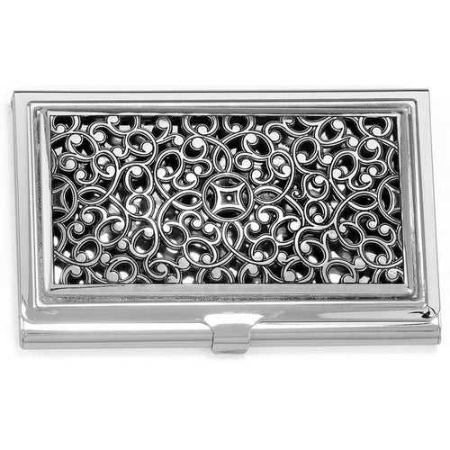 Brighton business card case with silver-tone ornate scrollwork filigree design and polished frame on a white background