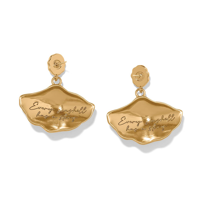 Brighton drop earrings shown from the back with gold-plated shell shapes engraved with cursive text on a white background