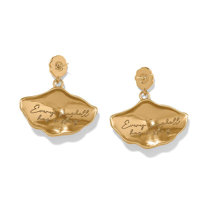 Brighton drop earrings shown from the back with gold-plated shell shapes engraved with cursive text on a white background