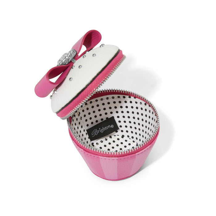 Brighton cupcake-shaped coin pouch shown open with pink zipper, bow accent, and polka dot interior on a white background