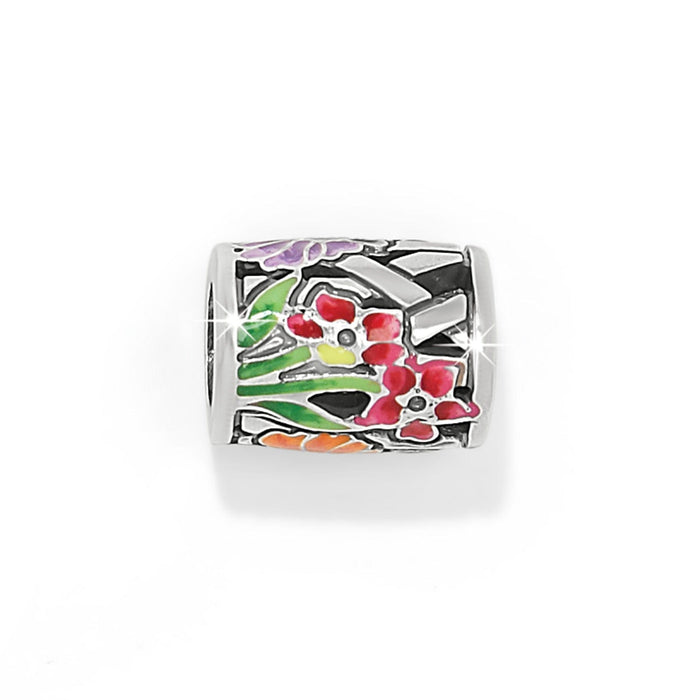 Brighton silver-plated barrel charm with enamel floral design in pink, purple, green, and orange on a white background