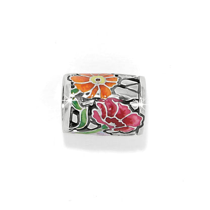 Brighton silver-plated charm bead with orange and pink enamel floral design and openwork detail on a white background