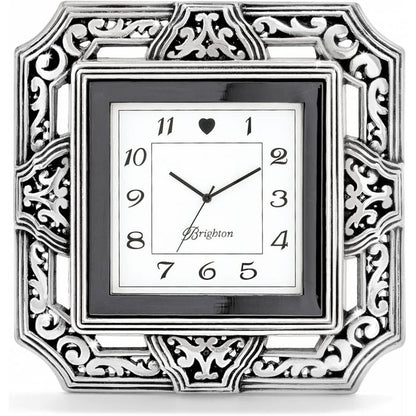 Brighton square clock with silver-plated ornate scrollwork frame and black border around numbered face on a white background