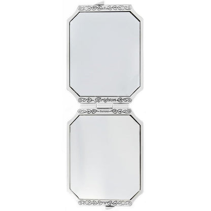 Brighton compact mirror shown open with silver-tone scrollwork frame and engraved logo detail on a white background