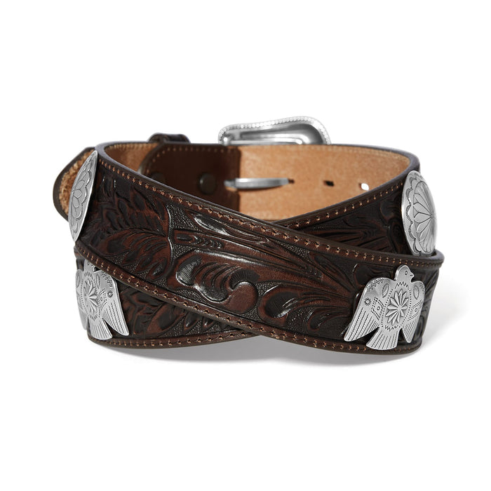 Brighton tooled brown leather belt with silver-tone thunderbird conchos and engraved buckle on a white background