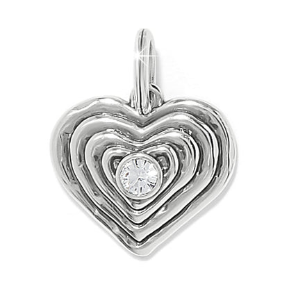 Brighton heart charm with silver-plated ridged layered design and central crystal accent on a white background