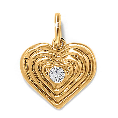 Brighton heart pendant charm with gold-plated ridged layers and a center crystal accent on a white background